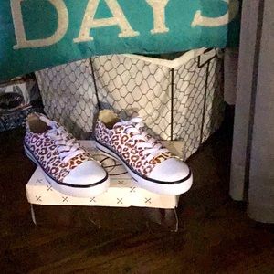 Leopard print tennis…